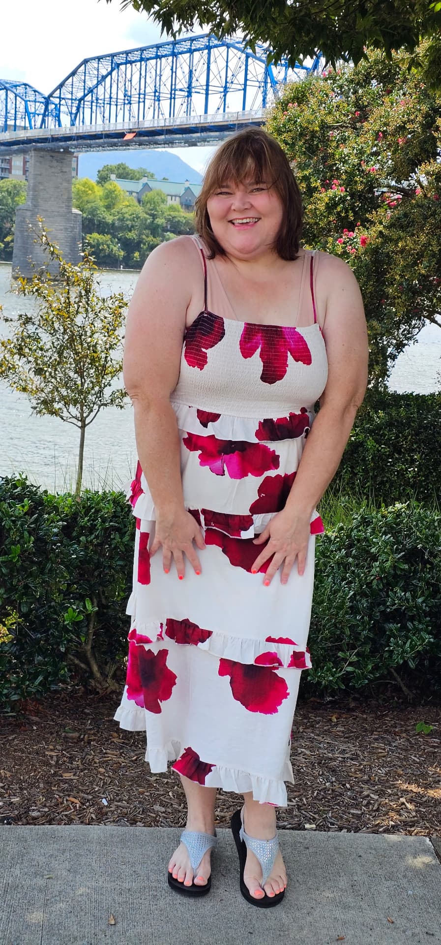 Myra beaming by the river